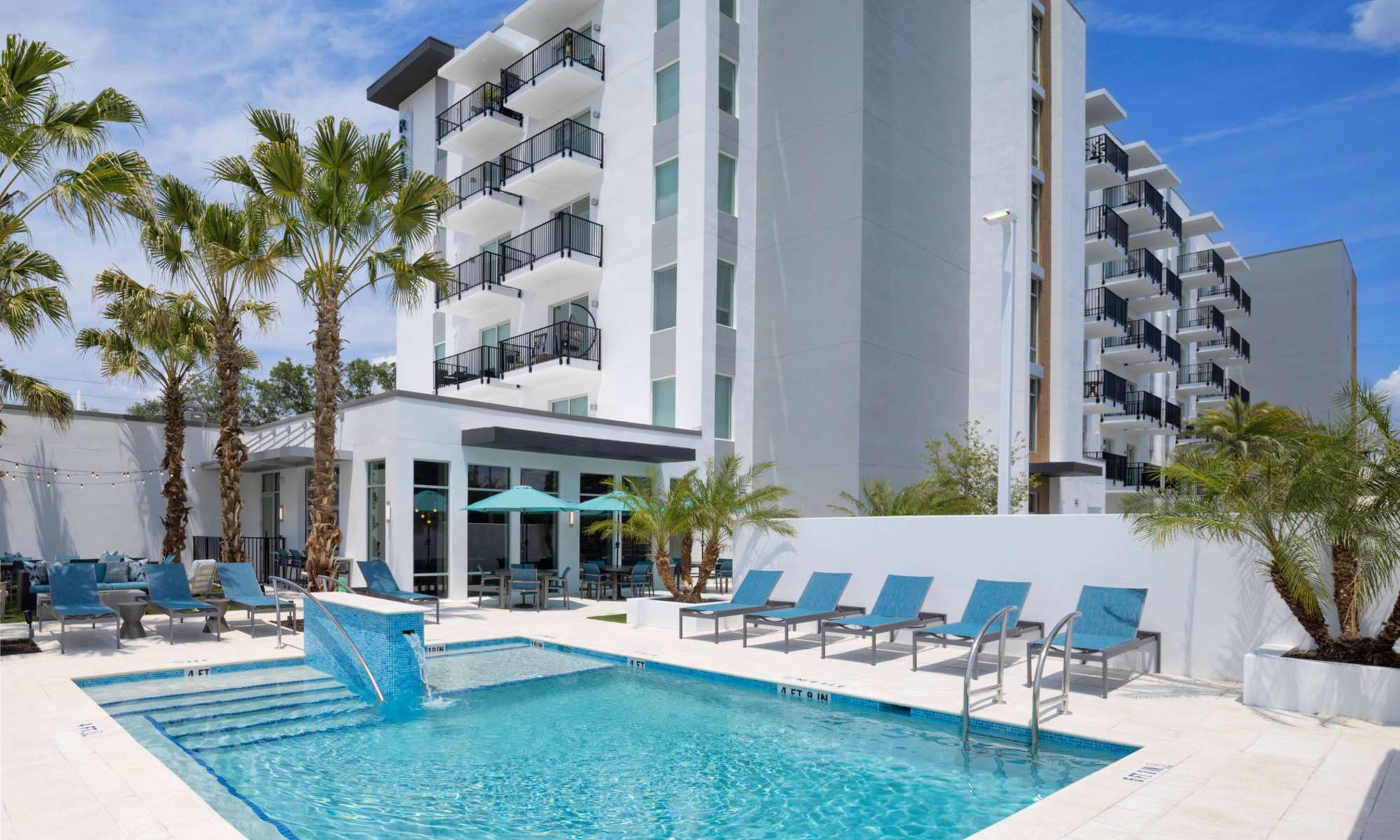 Building exterior and swimming pool at RainDance in Winter Haven, Florida