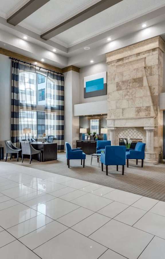 A spacious lobby with a reception desk and seating area. at Montecito Apartments, Texas