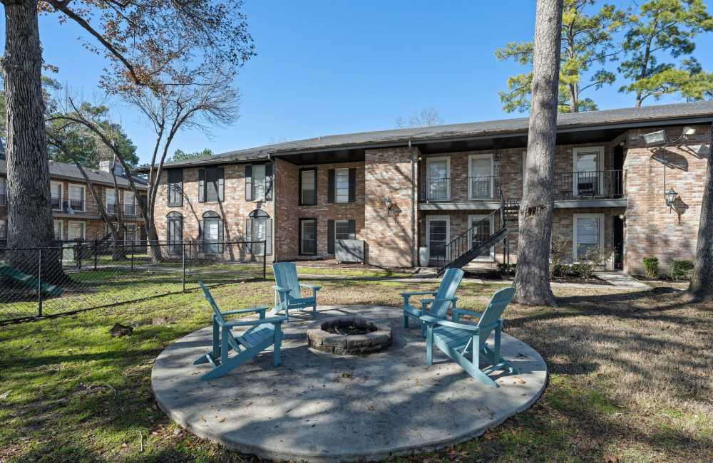Community fire-pit with seating at Verena at Cypresswood in Spring, Texas