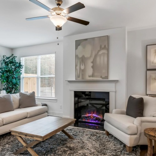 a living room with a fireplace