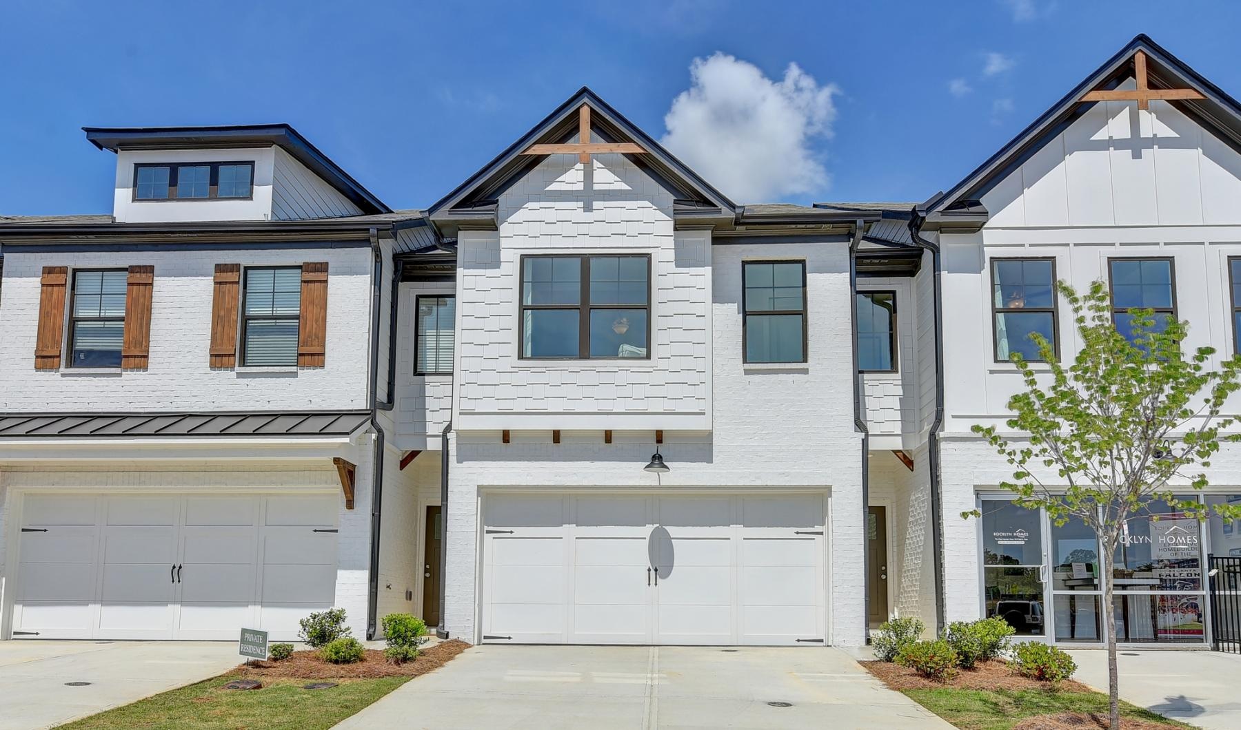 white houses with garages