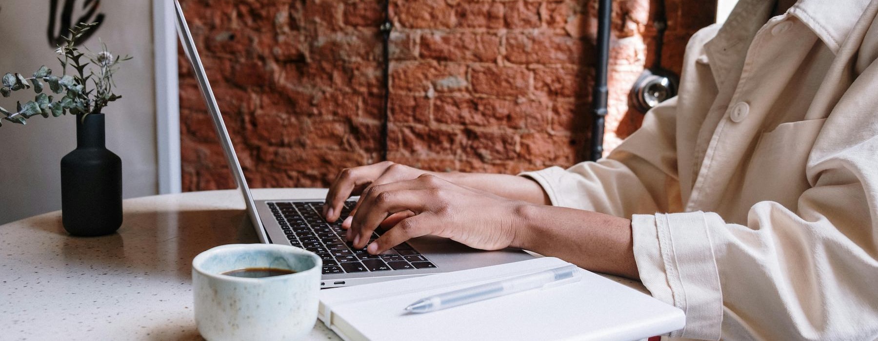 a woman working on her laptop