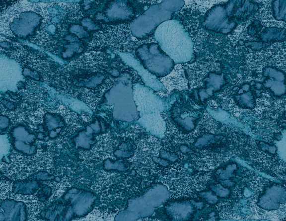 A close up of a textured surface with orange and blue colors.at The Residences at The Gilmore in Gilbert, AZ