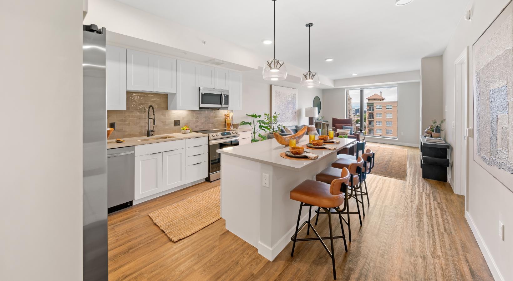 a kitchen with a table and chairs