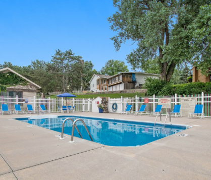 Amenities Include Outdoor Pool, Courtyard, Grill, On-site Laundry, and Garage Parking