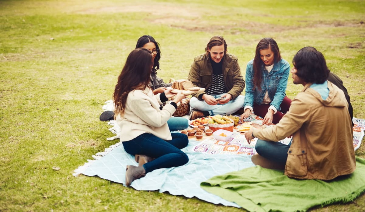 Residents hanging out together in a park near Parkway Villas in Broussard, Louisiana