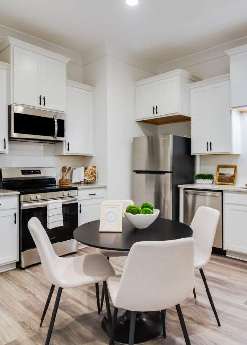 Cozy dining area in the modern kitchen at Parkway Villas in Broussard, Louisiana