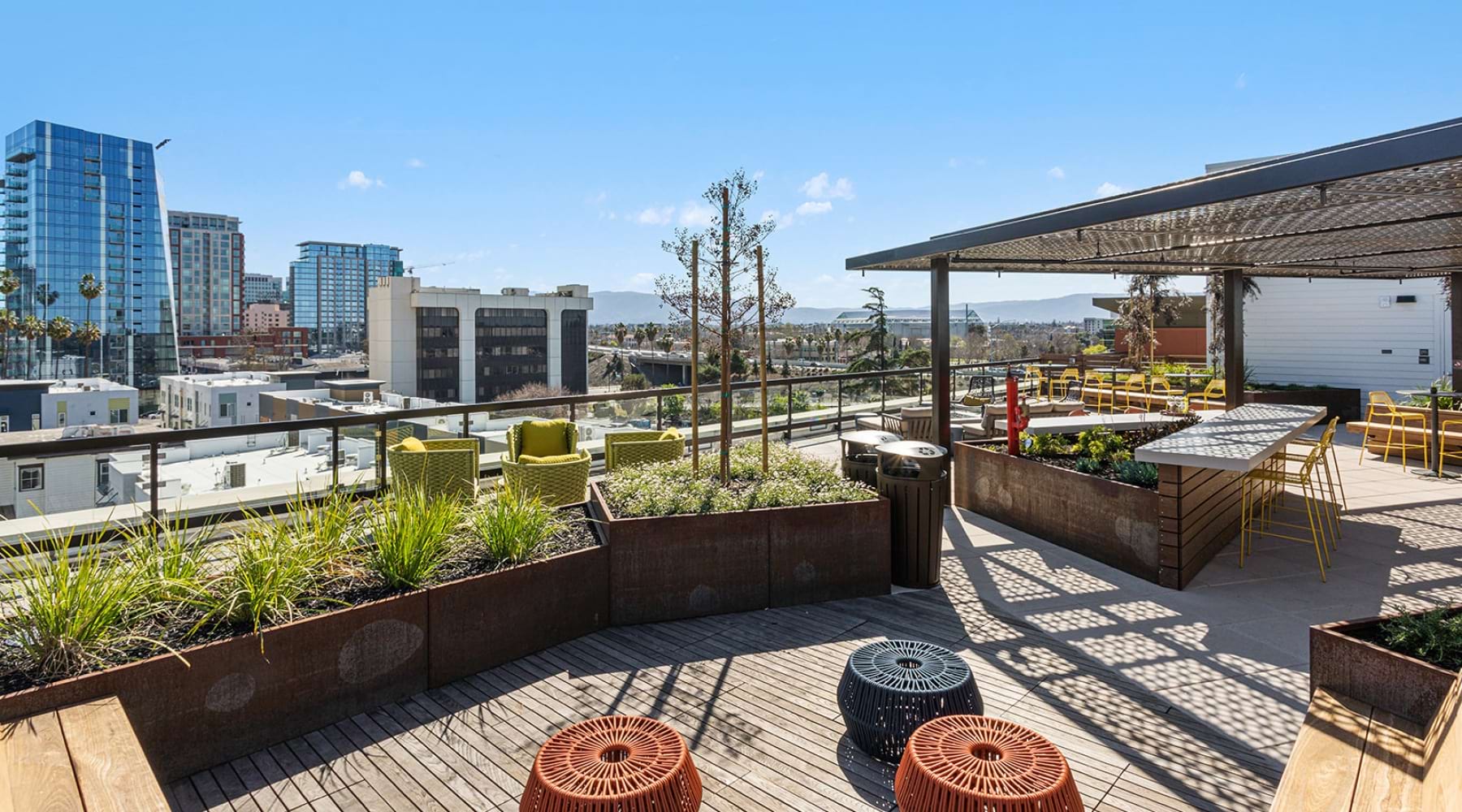 Large roof top deck with covered seating a a nice city view