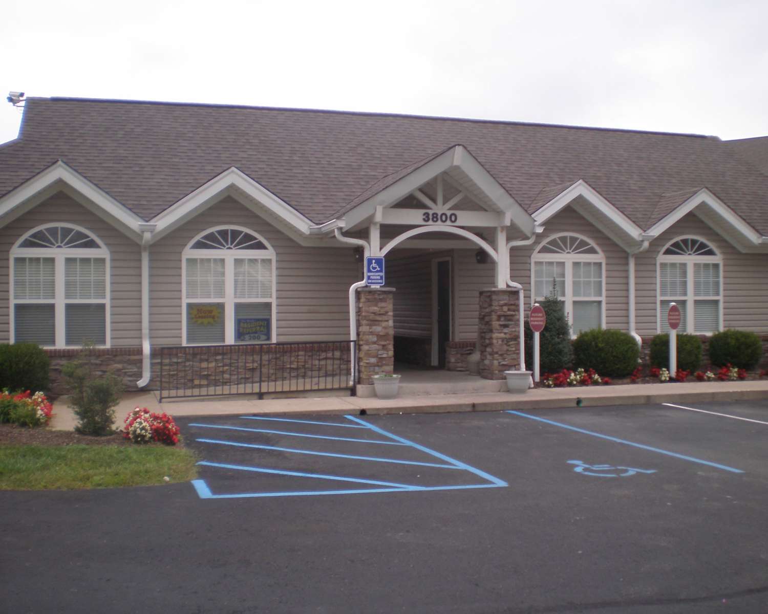Parking area in front of property at Falcon Crest Apartments in Louisville, Kentucky