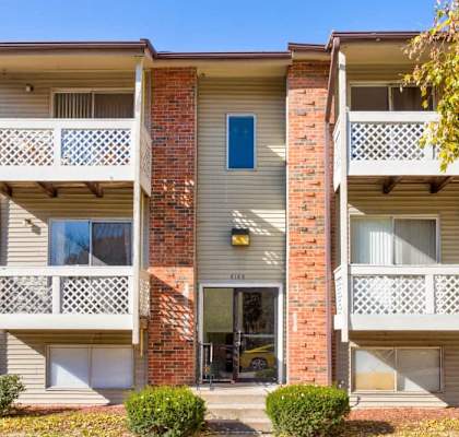 Exterior of building with private balconies and patios
