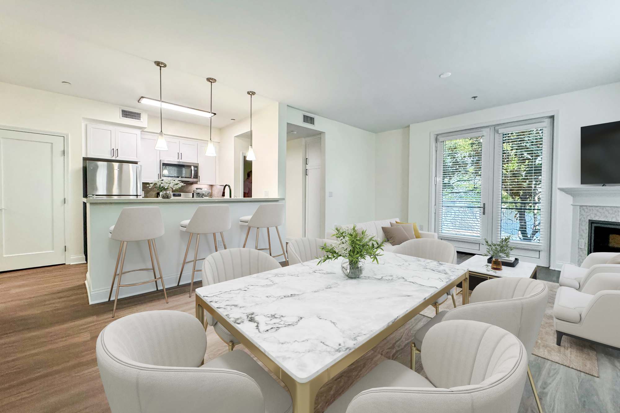 Kitchen and Dining Table in Apartment at La Belle at Hollywood Tower in Los Angeles, California