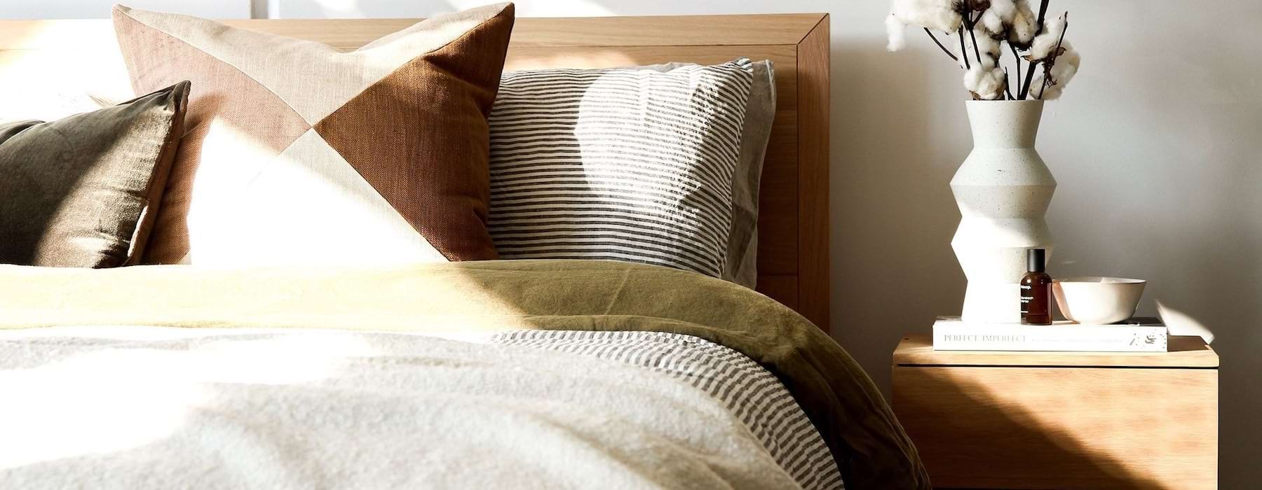 Pillows on a bed in a 1 bedroom apartment in Carlsbad, CA at Lucia at Aviara.