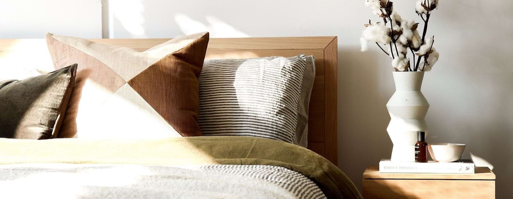 Pillows on a bed in a 1 bedroom apartment in Carlsbad, CA at Lucia at Aviara.
