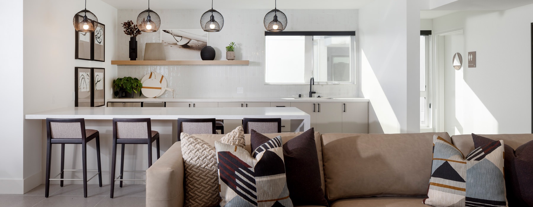 a large lounge with ample lighting