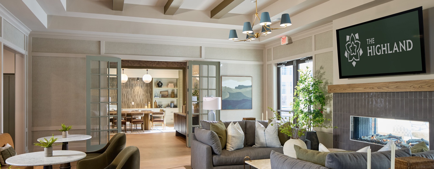 large room with couch and fireplace
