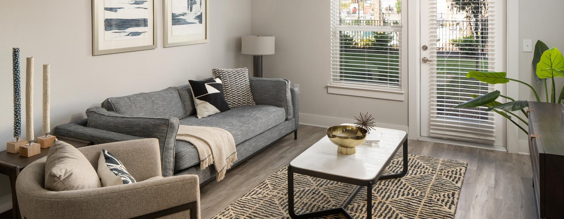 a living room with a couch and a coffee table