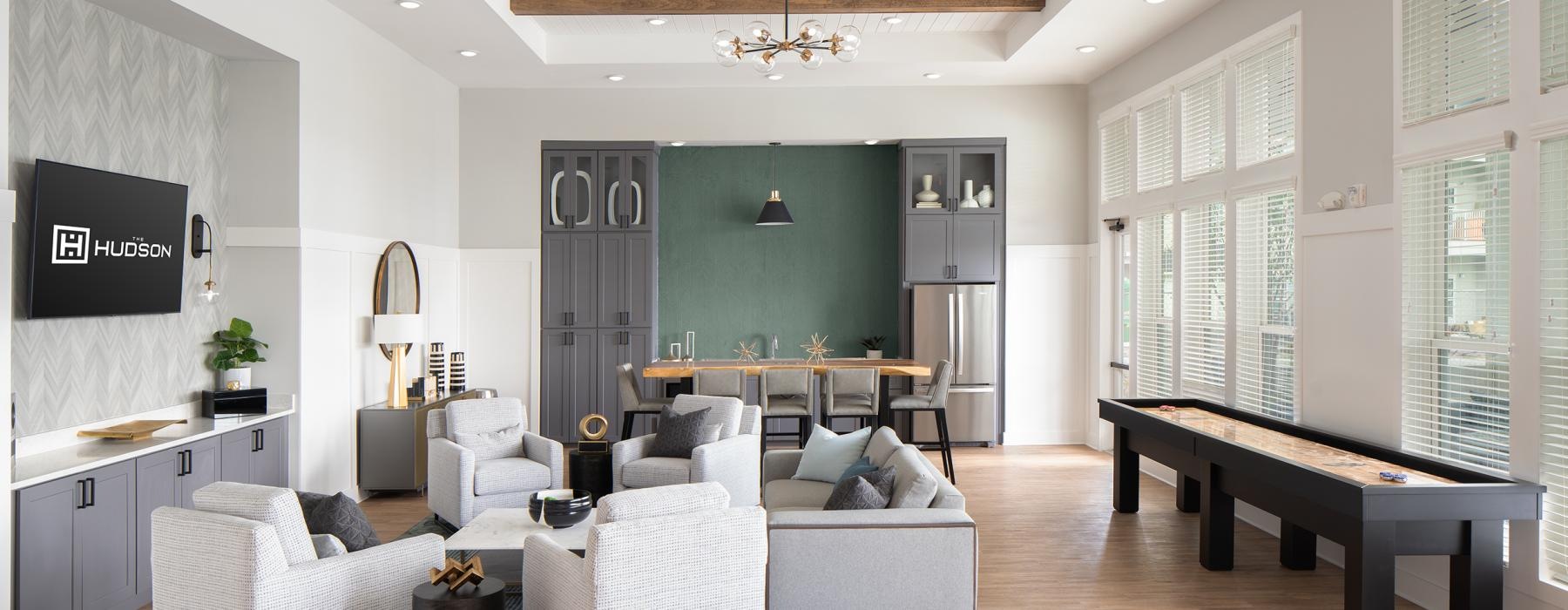 a living room with a couch and a table