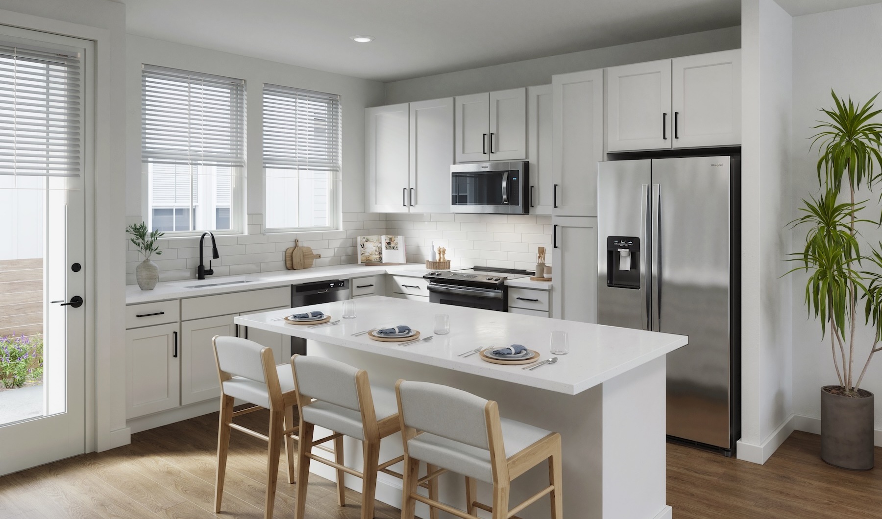 Foxtail by Banyan kitchen with an island and chairs at the best apartments in Austin.