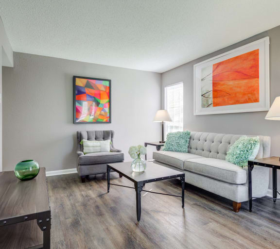 a living room with a couch and a table
