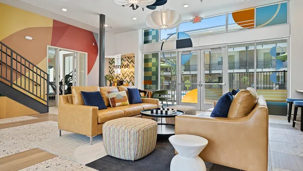 couches leading out to pool area