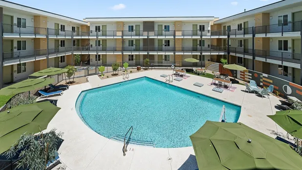 swimming pool with chairs
