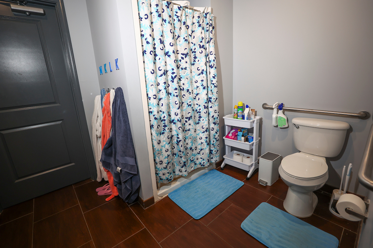Shared bathroom between two four-person suites