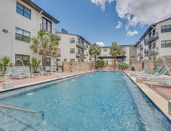 Large Outdoor Pool Area at Vue Live Oak Apartments, Texas