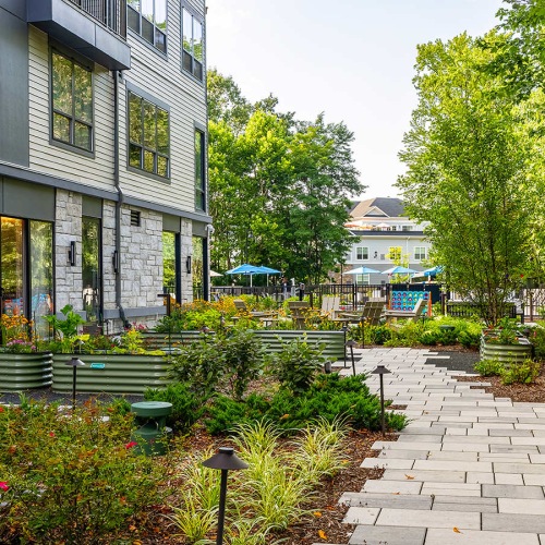 The grounds at Sylvan Woods Evesham senior living community in South Jersey, featuring a view of the apartment exteriors.