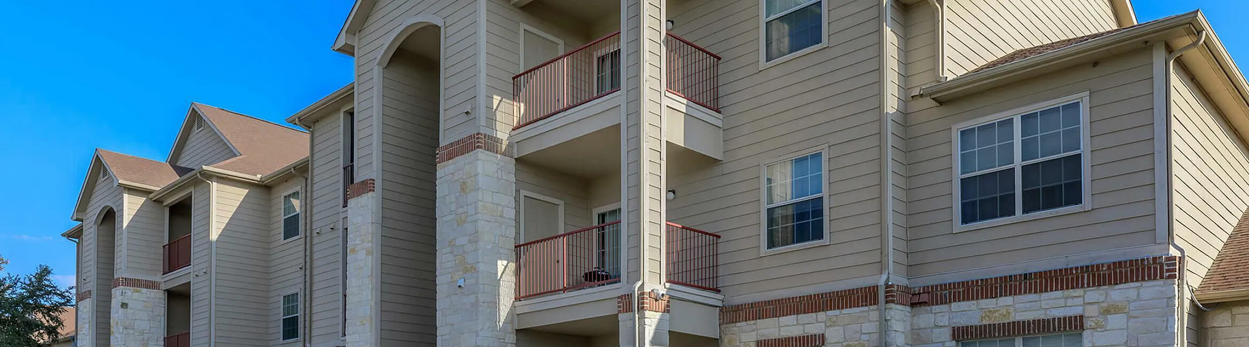 stylish brick and siding apartment building