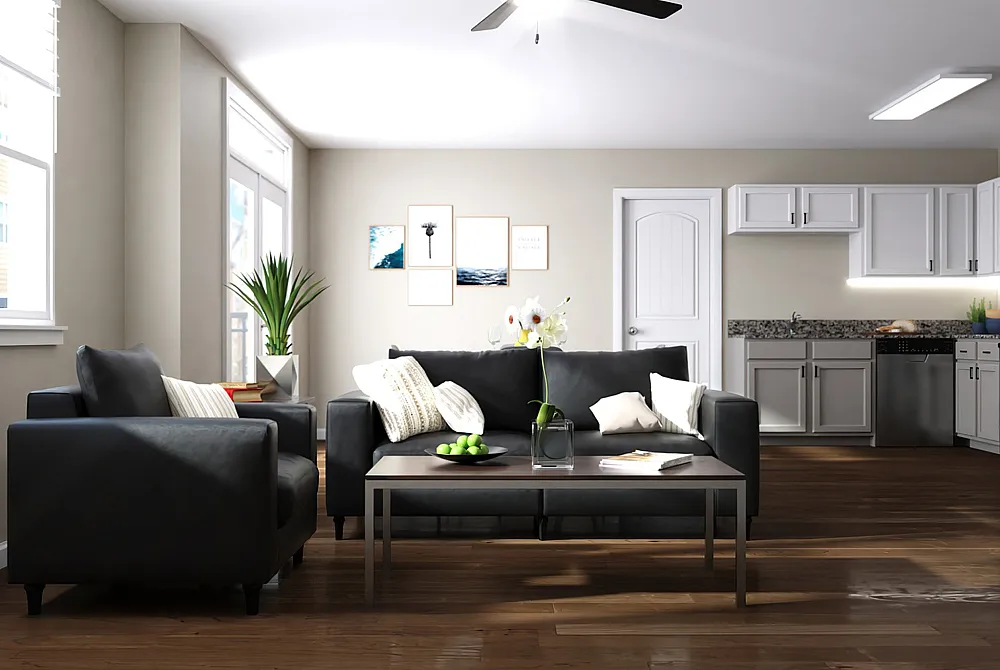 Modern living room with cozy seating, elegant coffee table, and open-concept kitchen featuring sleek cabinetry and appliances.