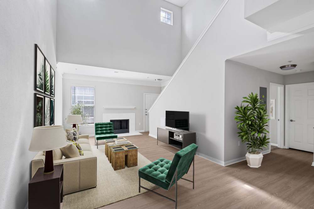 Townhome living room with staircase Highlands at Alexander Pointe in Charlotte, North Carolina