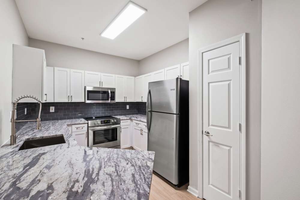 Kitchen in a model home at Highlands at Alexander Pointe in Charlotte, North Carolina