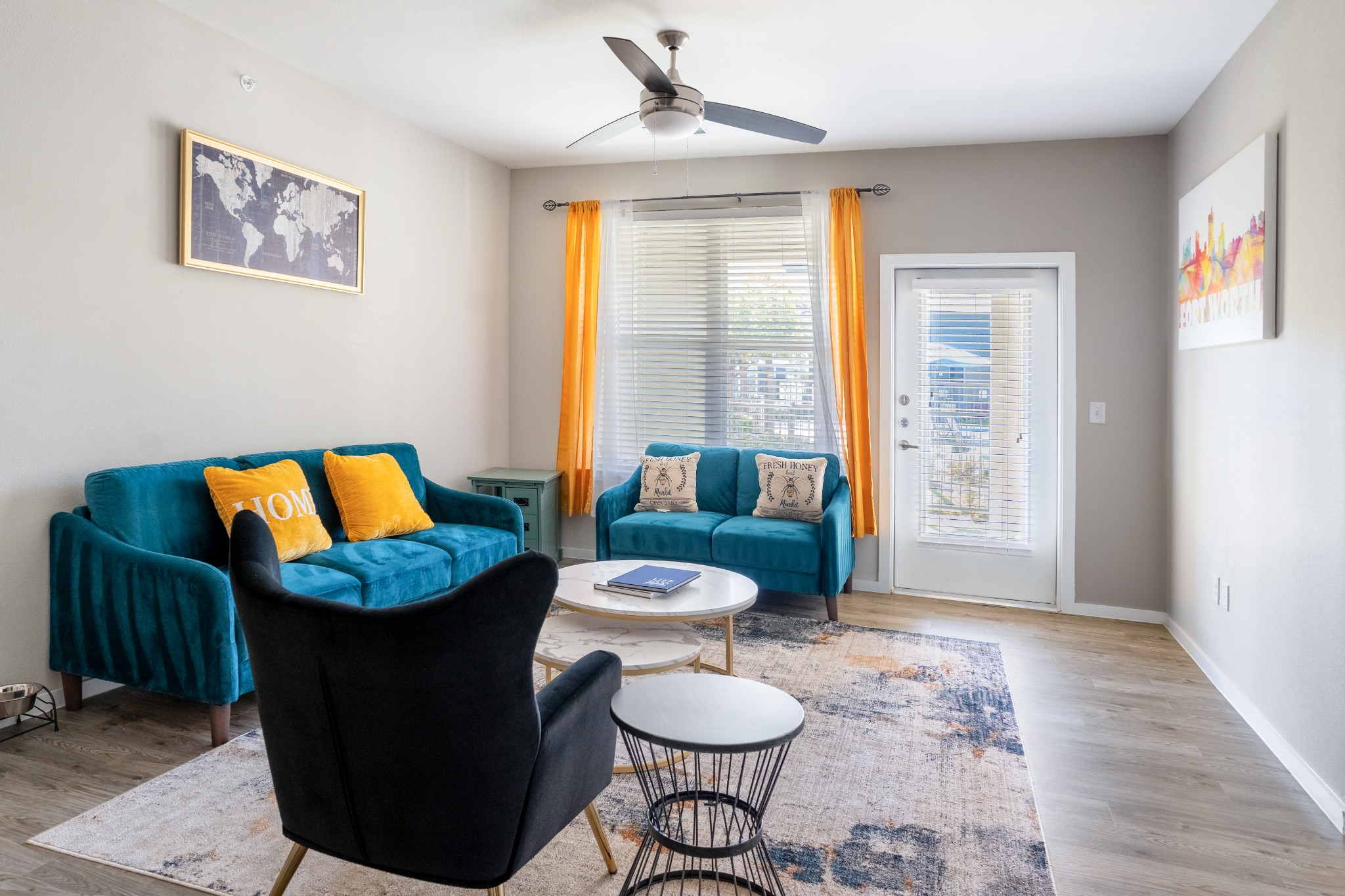 Furnished Landmark at Crowley apartment living room with direct access to a private outdoor space