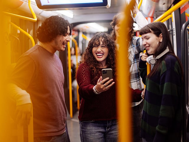Young people on a subway.