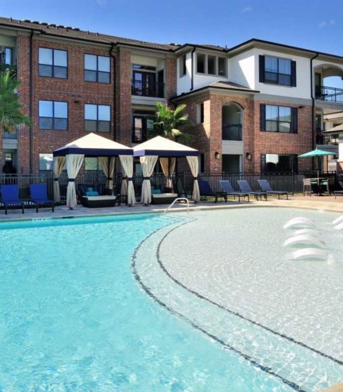 Swimming pool area at Harmony Park in Spring, Texas