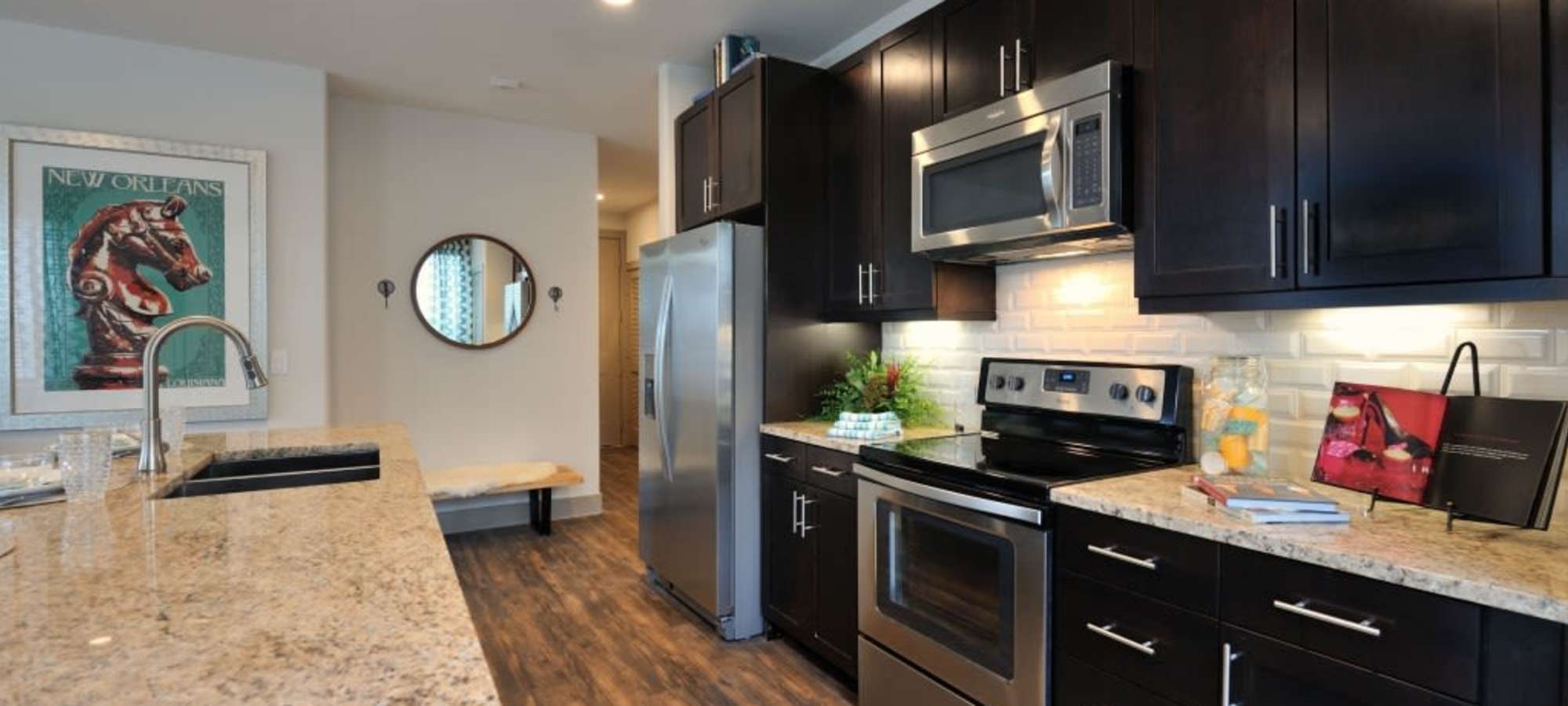 Kitchen with wooden cabinet at Harmony Park in Spring, Texas