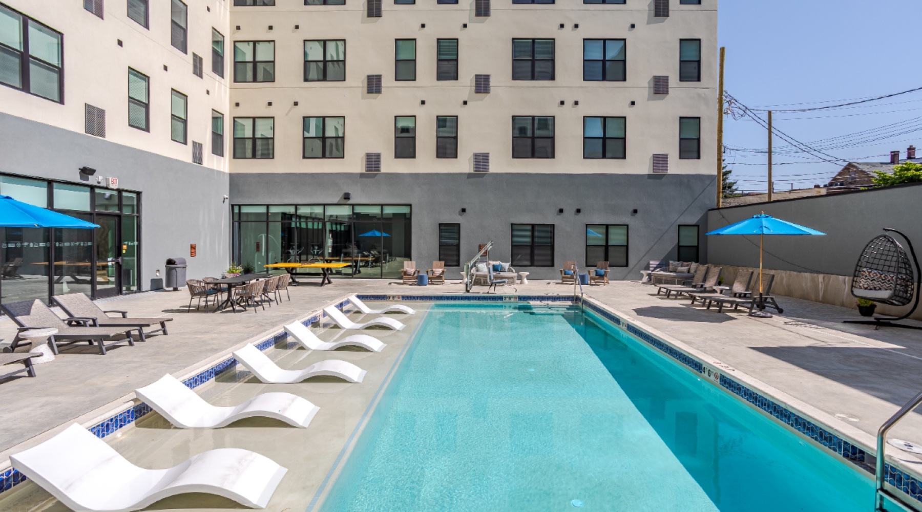 sparkling pool with lounge chairs