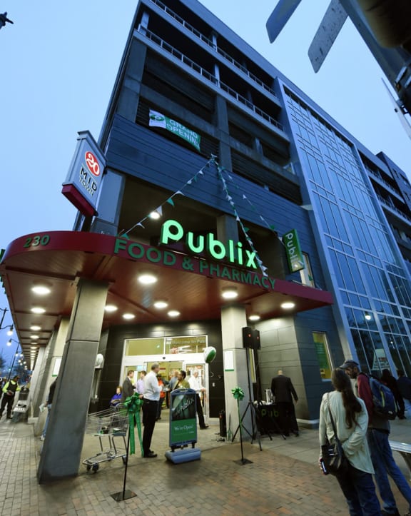 a building with people standing outside of it at 20 Midtown, Birmingham, AL, 35233