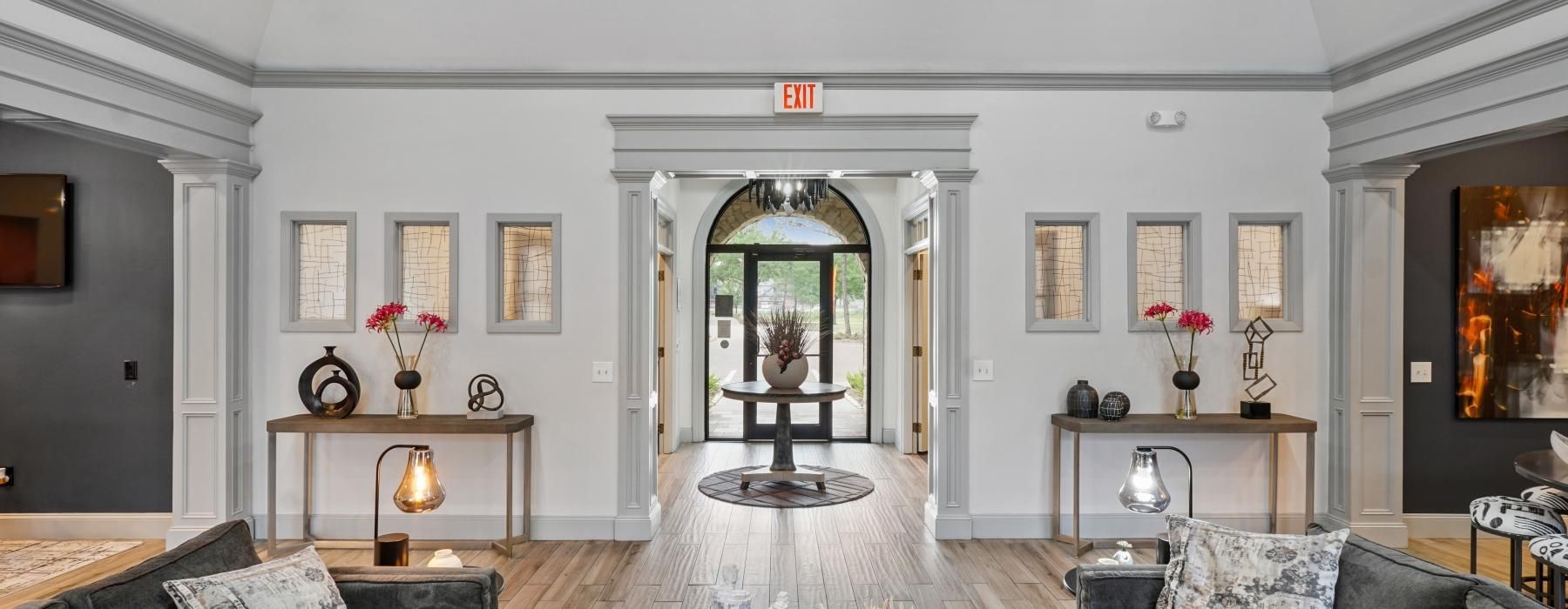 a lobby with a large arched doorway