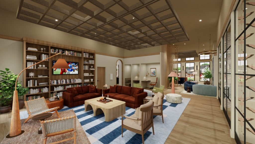 modern clubhouse lounge with bookshelves and tv at chandelier in oxford ms