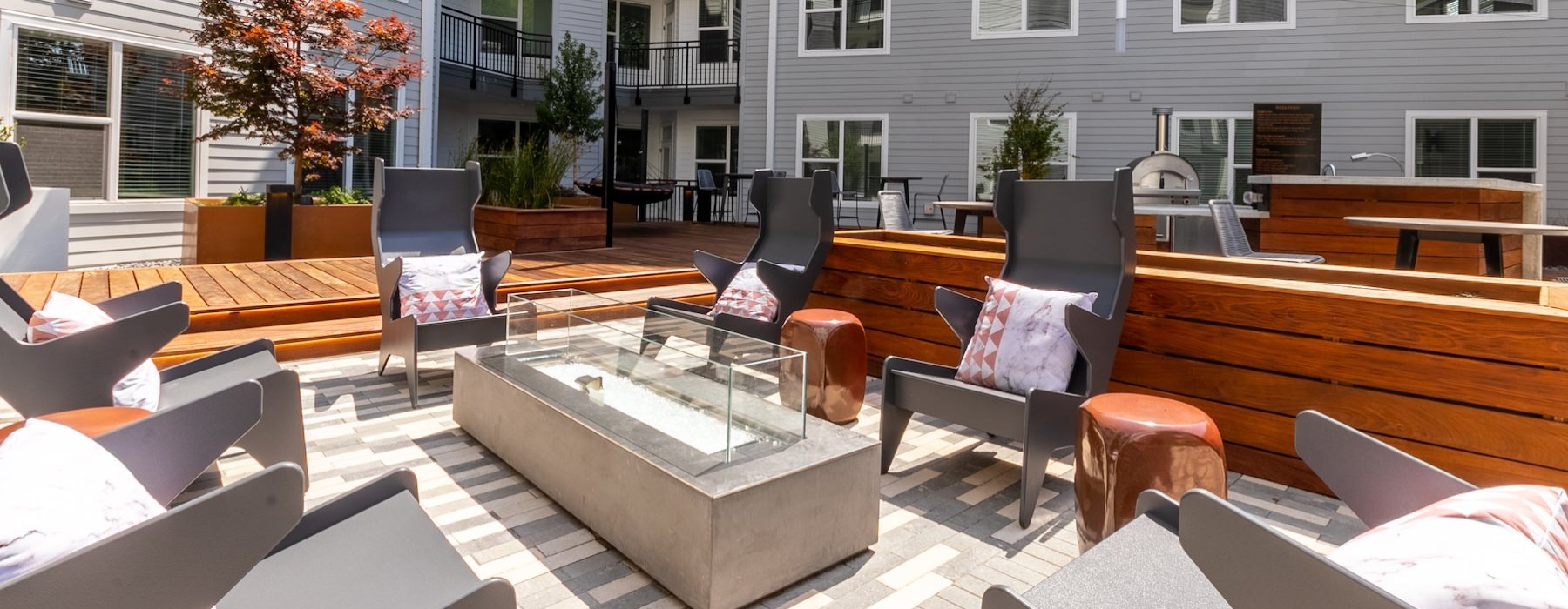 a fire pit with chairs
