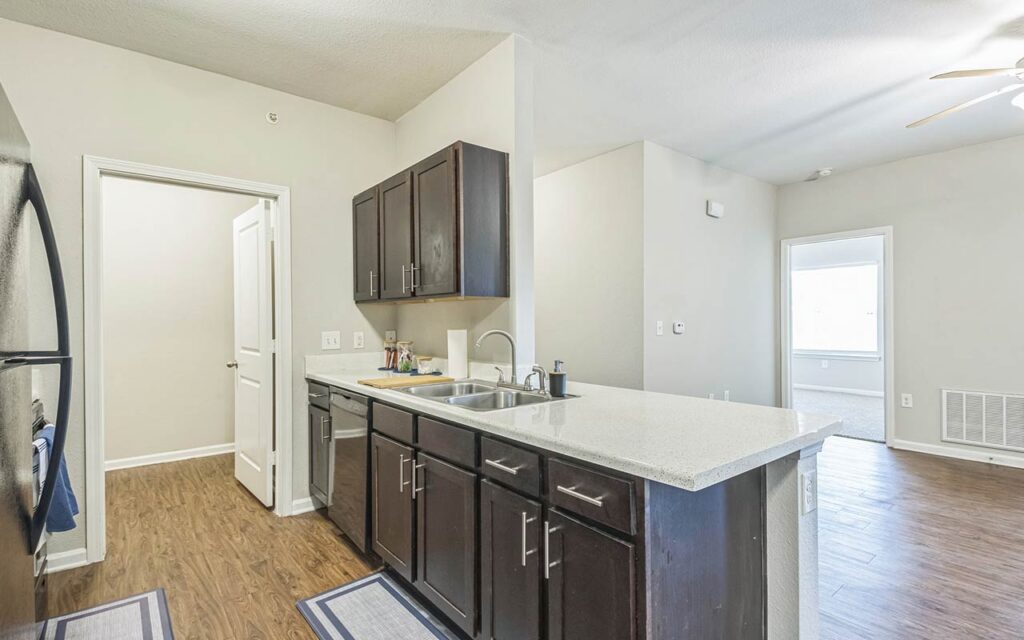 The Villas at Colt Run apartment interior kitchen and living area