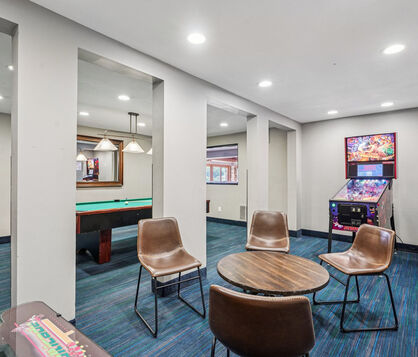 Amenities include Billiards Table, Heated Underground Parking, Controlled Access, Fitness Center, and Indoor Pool