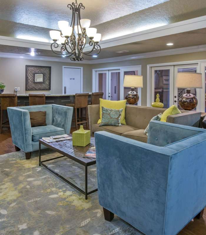 Clubhouse with chairs and table at Marks Church Commons in Augusta, Georgia