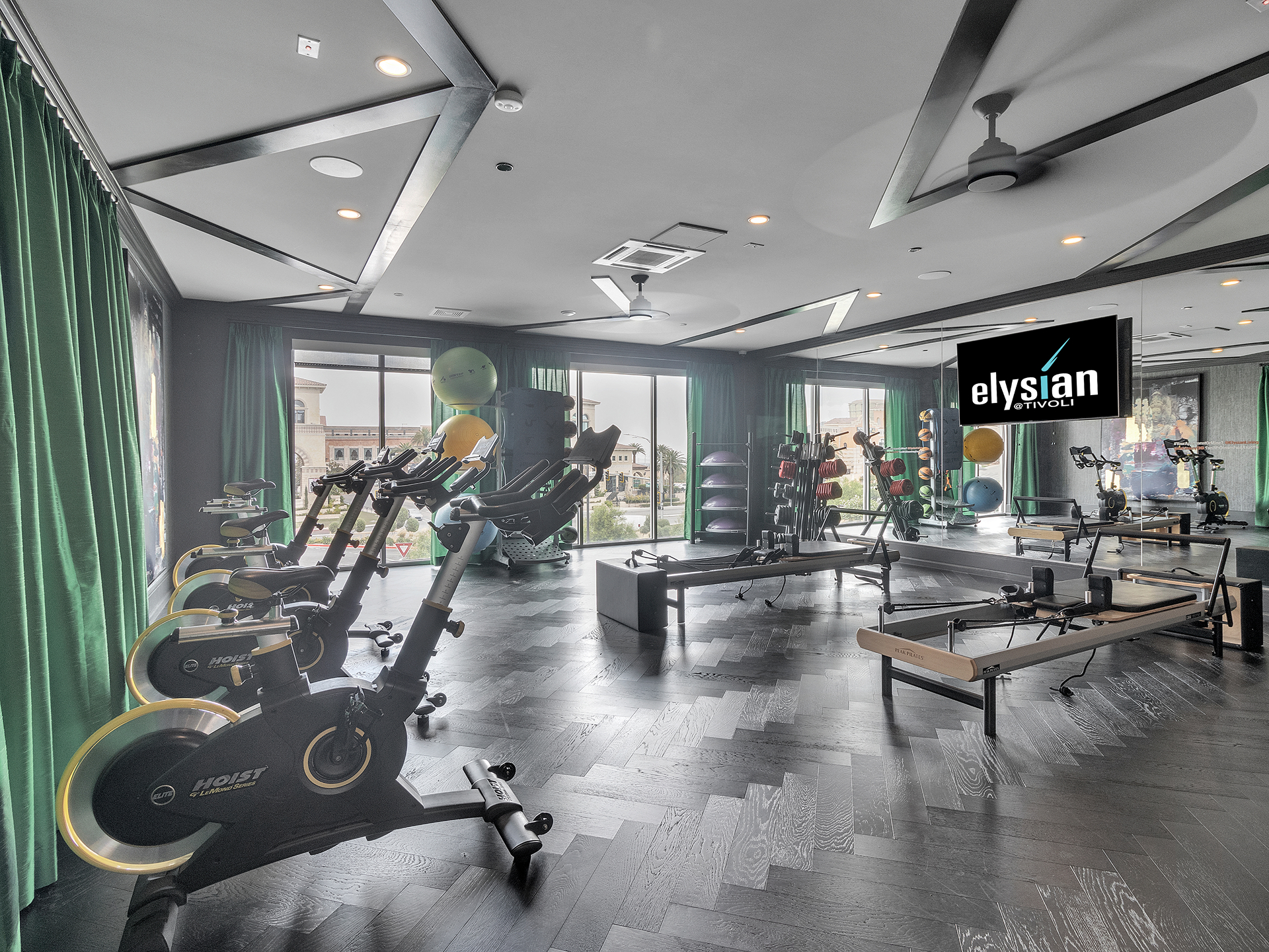Modern luxury apartment gym with stylish interiors