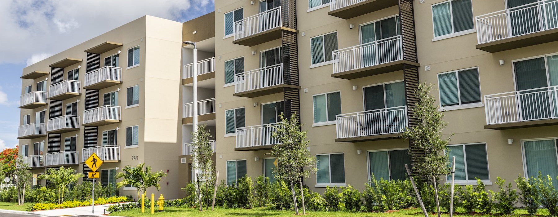 the exterior of a building with many windows