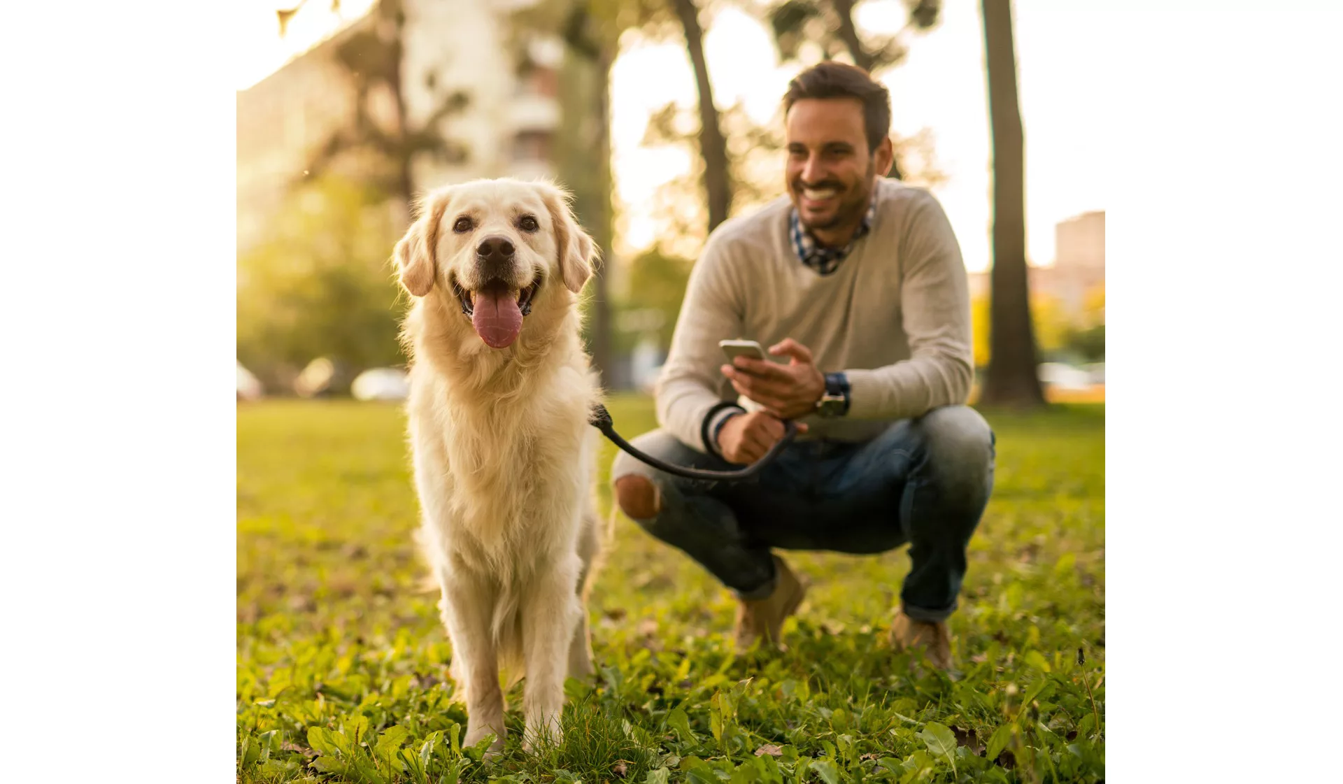 Man with golden retriever