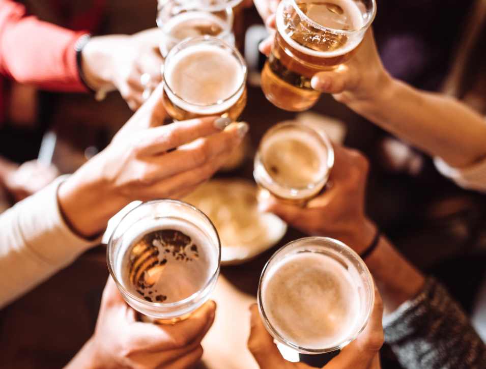 Cups toasting at The Garnett in Brooklyn, New York