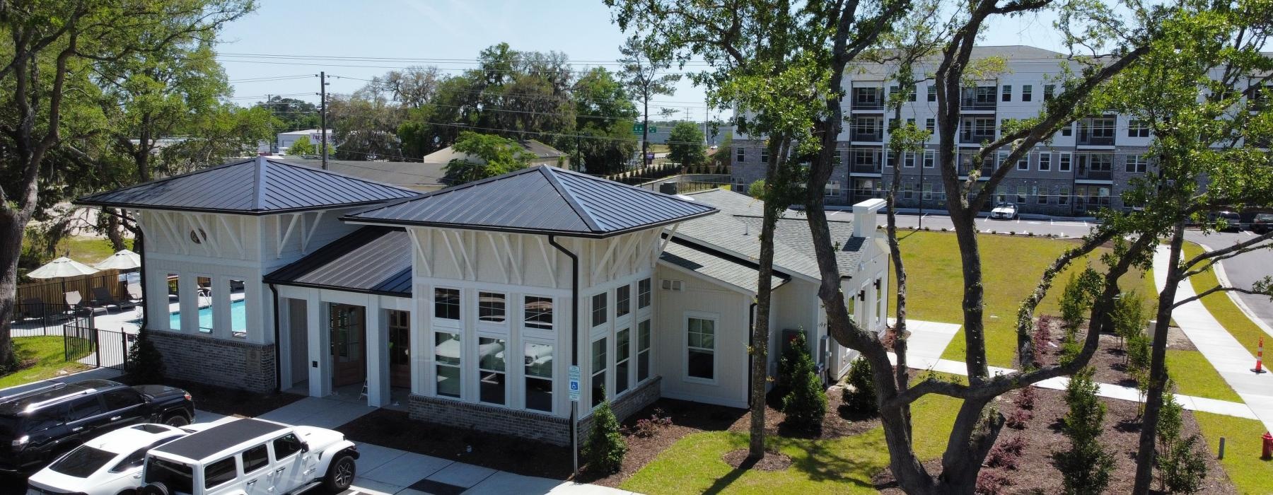a building with cars parked in front