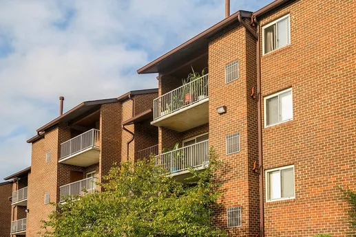 Exterior buildings with outdoor balconies.